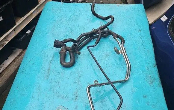 Volkswagen Golf VII Engine coolant pipe/hose 04E122447K IMPRK1251920
