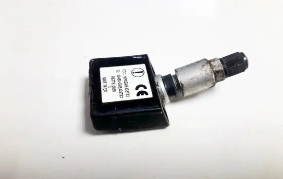 Opel Zafira B Tire pressure sensor 24437708 2546a-gme433tx1