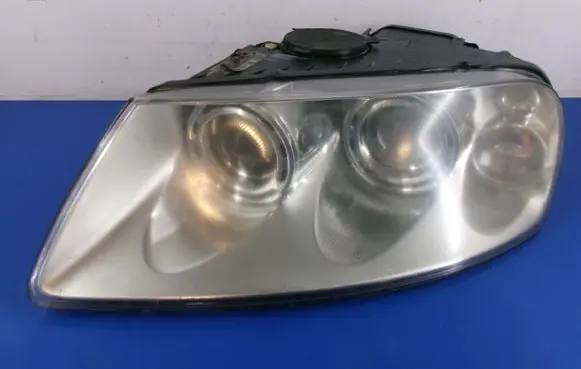 Volkswagen Touareg I Headlight/headlamp 7L6941015BK