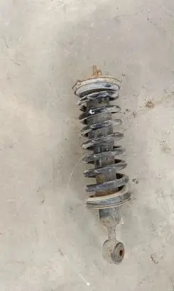 Nissan Navara D40 Front shock absorber with coil spring