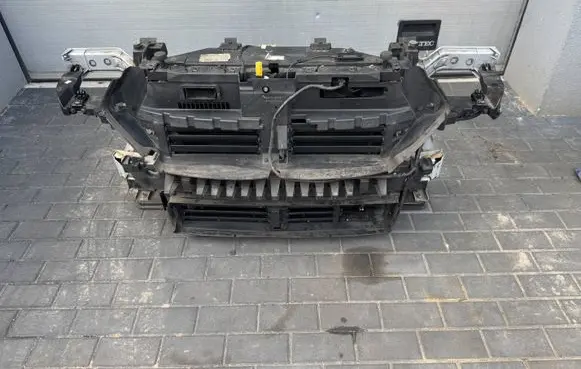 Radiator support slam panel