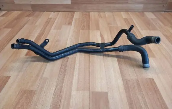 Volkswagen Touareg I Engine coolant pipe/hose 7L6121065