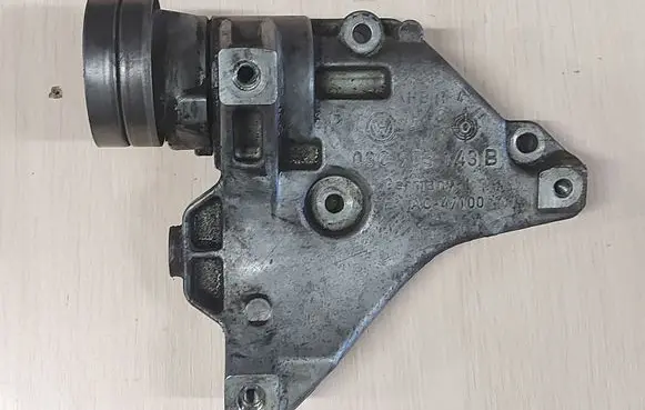 Volkswagen Tiguan A/C compressor mount bracket 03C903143B
