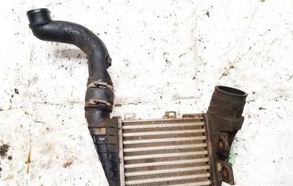 Volkswagen Golf III Intercooler radiator 1h0145805