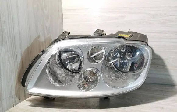 Volkswagen Touran I Headlight/headlamp 1T0941005F 0301005201