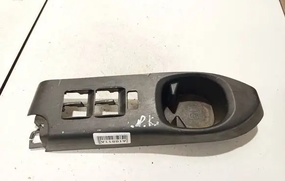 Daihatsu Materia Front door window switch trim 67698b1020