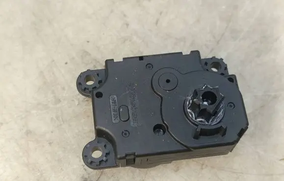 Opel Corsa F Air flap motor/actuator 16000458 TB1102 HAD36011A