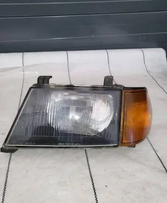 Mitsubishi Pajero Sport I Headlight/headlamp 11087194