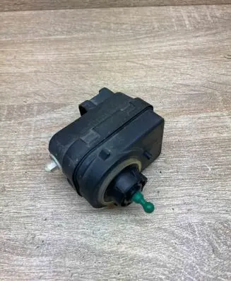 Renault Scenic I Headlight level adjustment motor 7700840141