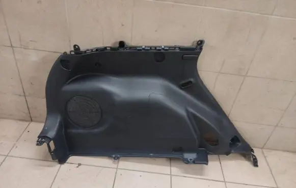 Trunk/boot lower side trim panel