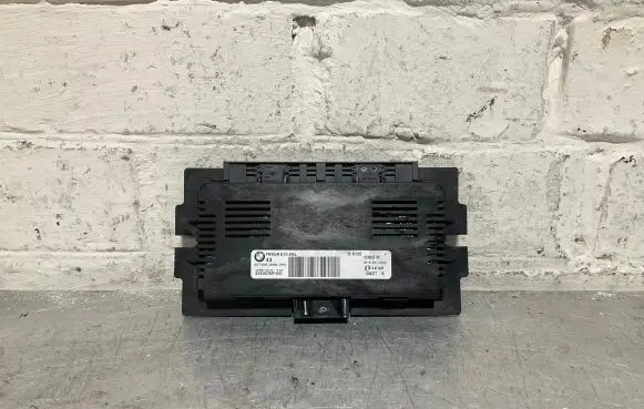 BMW X5 E70 Light module LCM 9230433 608377 S6135