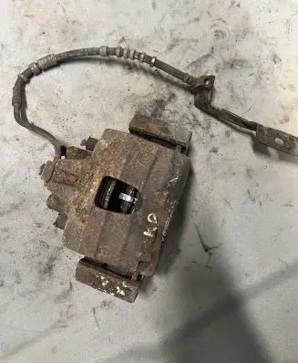 Chrysler Grand Voyager IV Front brake caliper