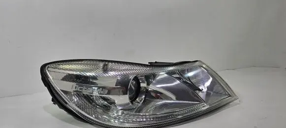 Skoda Octavia Mk2 (1Z) Headlight/headlamp 12412623534