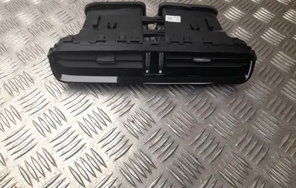 Jaguar XF Dash center air vent grill GX63014L21AB