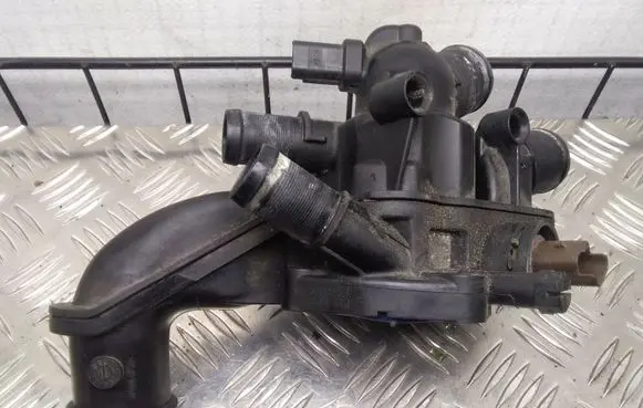 Thermostat/thermostat housing