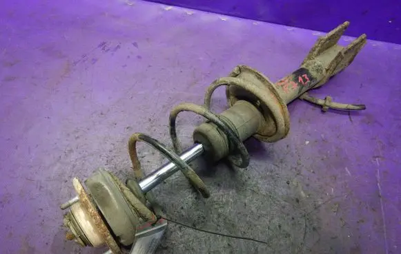 Fiat Uno Front shock absorber with coil spring