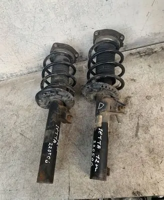 Volkswagen Jetta VI Front shock absorber with coil spring