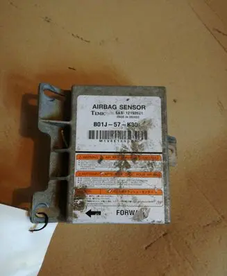 Mazda 323 Airbag control unit/module B01J57K30