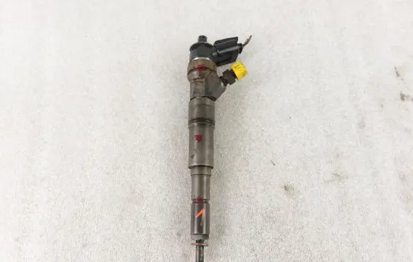 BMW 3 E46 Fuel injector 7788609 0445110080