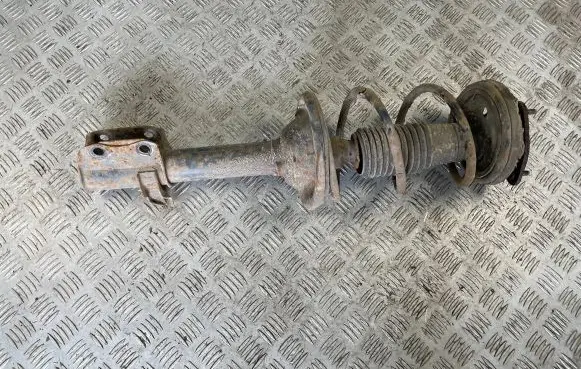 Subaru Impreza I Rear shock absorber with coil spring 