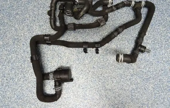 Volkswagen Golf VII Engine coolant pipe/hose 5C0965567