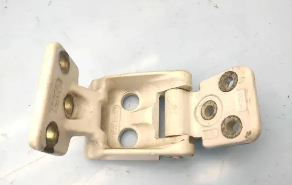 Rear door upper hinge