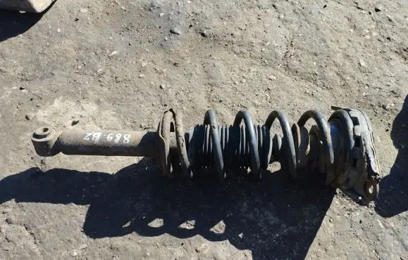 Nissan Almera N16 Rear shock absorber with coil spring 