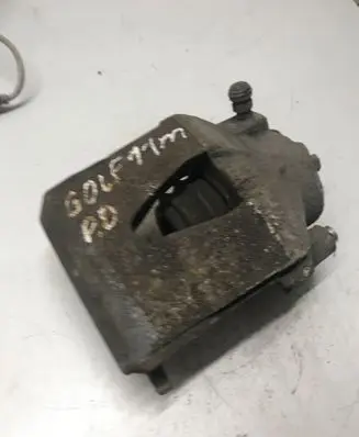 Volkswagen Golf VI Front brake caliper 582