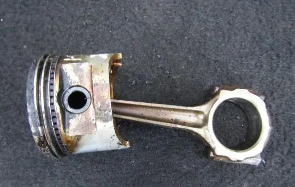 Piston with connecting rod