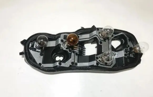 Opel Corsa D Tail light bulb cover holder 89037852