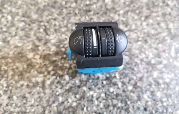 Volkswagen Touareg I Headlight level height control switch 7L6941333D