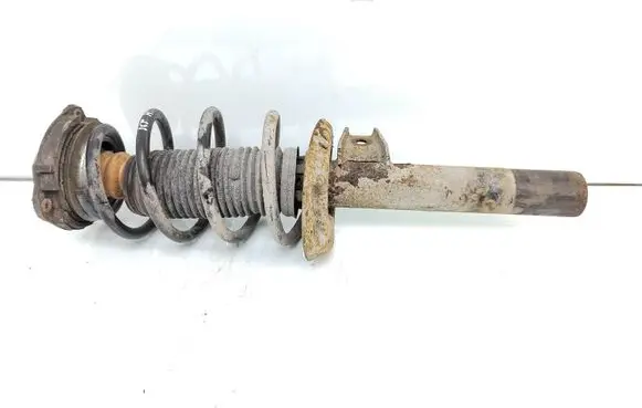Skoda Octavia Mk2 (1Z) Front shock absorber with coil spring