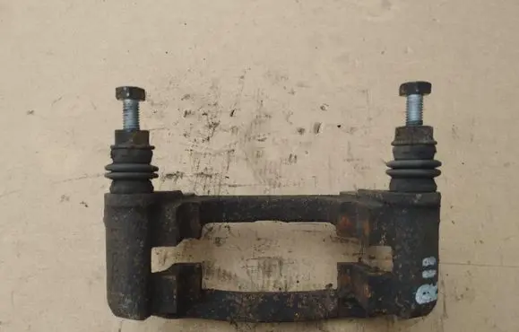 Renault Trafic III (X82) Brake caliper pad carrier rear 323277507