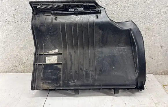 Trunk/boot lower side trim panel