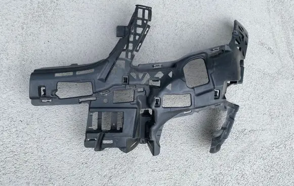 Front bumper mounting bracket