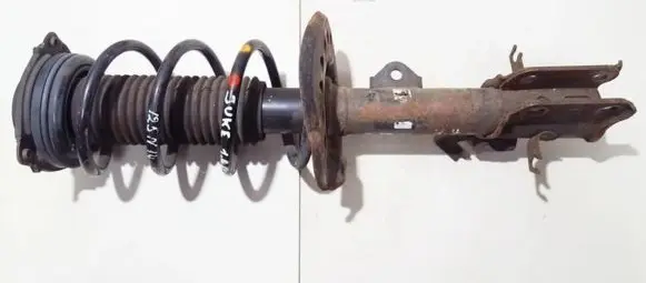 Nissan Juke I F15 Front shock absorber/damper