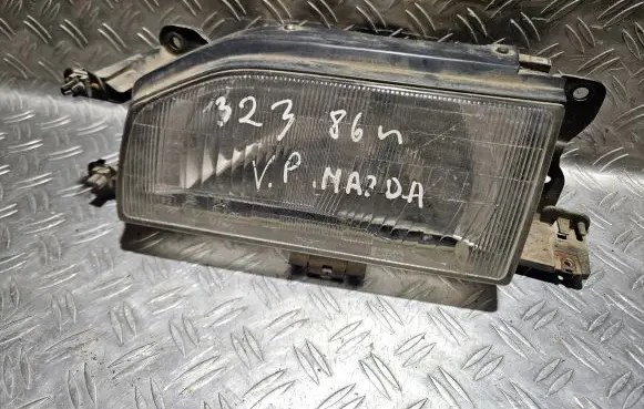 Mazda 323 Headlight/headlamp 11061247 11061249