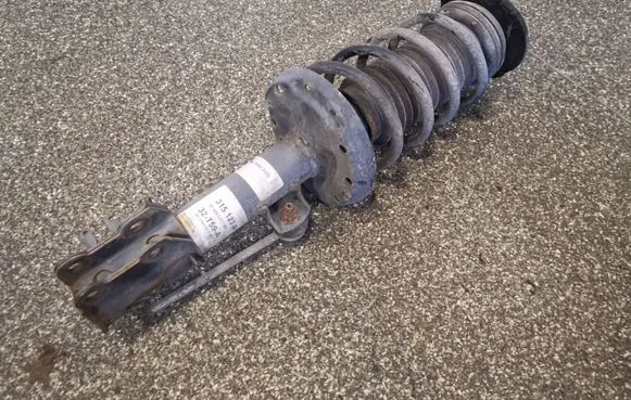 Front shock absorber with coil spring