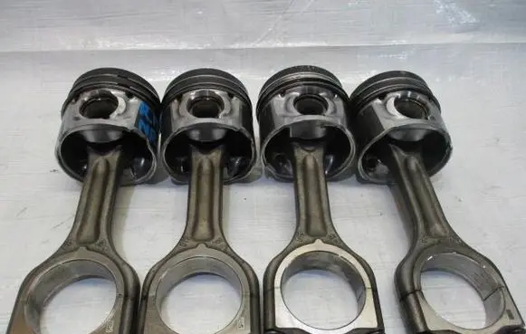 Piston with connecting rod