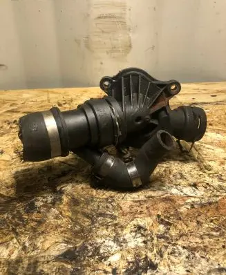 Thermostat/thermostat housing