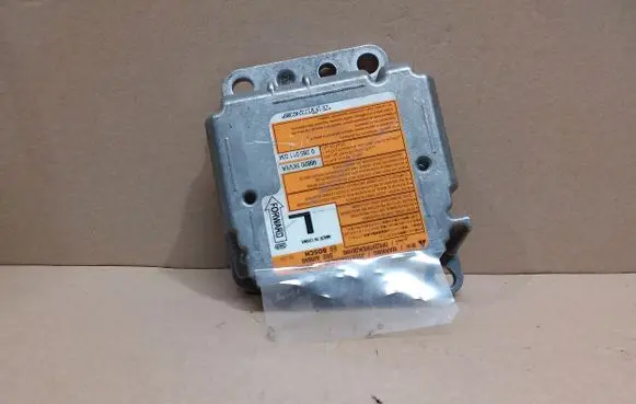 Nissan Juke I F15 Airbag control unit/module 988201KV1A 0285011034