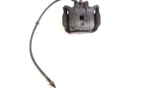 Nissan Juke I F15 Front brake caliper 