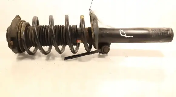 Volkswagen PASSAT B7 Front shock absorber with coil spring 335808
