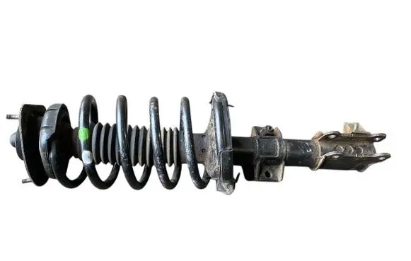 Front shock absorber with coil spring