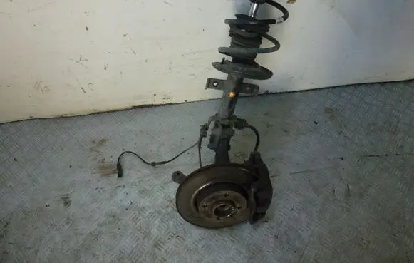 Front wheel hub spindle knuckle