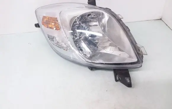 Toyota Yaris Headlight/headlamp 811500D130 89900739