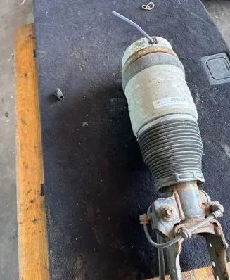 Volkswagen Touareg I Front air suspension shock absorber 7L6412021AF