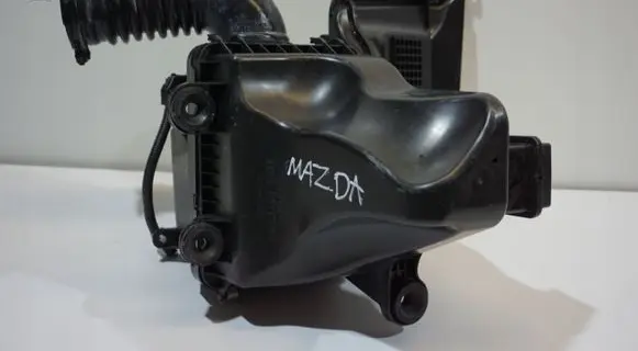 Mazda 323 Air filter cleaner box bracket assembly 