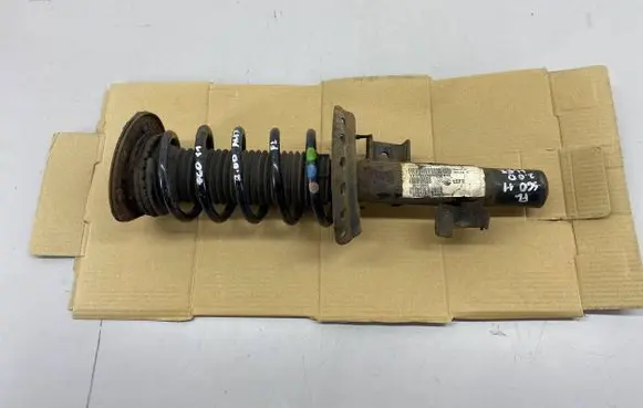 Front shock absorber with coil spring