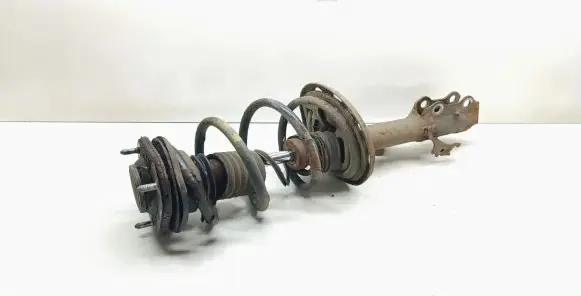 Front shock absorber with coil spring